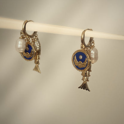 Saltwater Spell Asymmetrical Earrings, huggie hoops with evil eye, fish and pearl